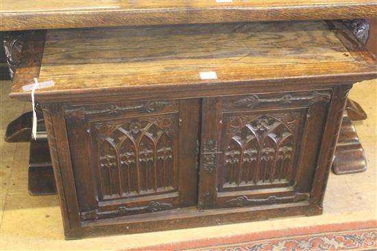 Oak low cabinet with tracery-carved doors